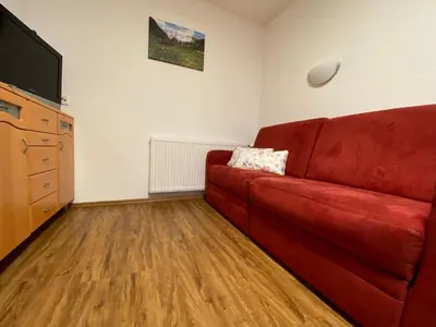 Ein Sitzbereich in der Unterkunft Ferienhaus Oberhuben