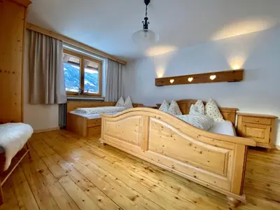 Ein Bett oder Betten in einem Zimmer der Unterkunft Ferienhaus Oberhuben
