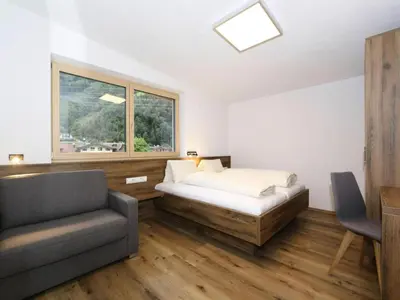 Ein Bett oder Betten in einem Zimmer der Unterkunft Holiday Home in Aschau by Zillertal Alps