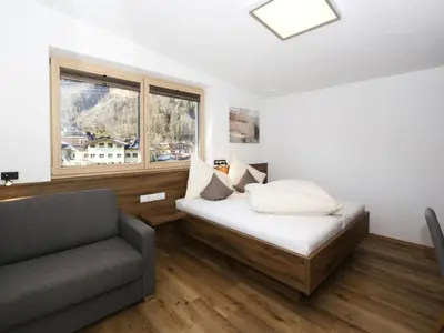Ein Bett oder Betten in einem Zimmer der Unterkunft Holiday Home in Aschau by Zillertal Alps