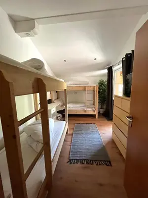 Ein Bett oder Betten in einem Zimmer der Unterkunft Penthouse Brixen