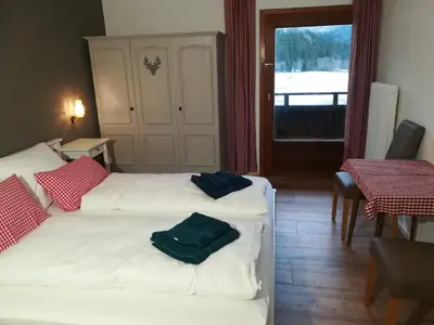 Ein Bett oder Betten in einem Zimmer der Unterkunft Haus Gartner appartement 6 - 8 personen