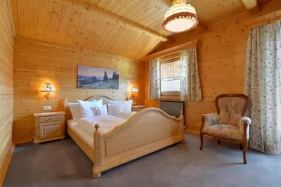 Ein Bett oder Betten in einem Zimmer der Unterkunft Ferienwohnung Scheffau