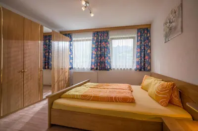 Ein Bett oder Betten in einem Zimmer der Unterkunft Ferienwohnungen Familie Rieder