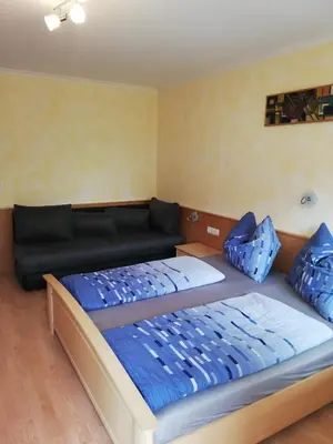 Ein Bett oder Betten in einem Zimmer der Unterkunft Apart La Vita