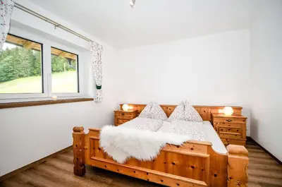 Ein Bett oder Betten in einem Zimmer der Unterkunft Apartment Mayerhofer