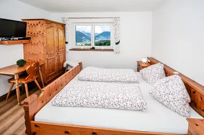 Ein Bett oder Betten in einem Zimmer der Unterkunft Apartment Mayerhofer