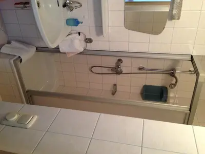 Ein Badezimmer in der Unterkunft Haus Tenk