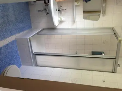 Ein Badezimmer in der Unterkunft Haus Tenk