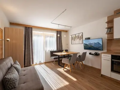 Ein Sitzbereich in der Unterkunft Ferienwohnungen Luxner