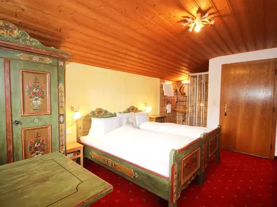 Ein Bett oder Betten in einem Zimmer der Unterkunft Apartment Michaela by Interhome
