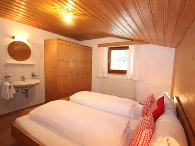 Ein Bett oder Betten in einem Zimmer der Unterkunft Apartment Michaela by Interhome