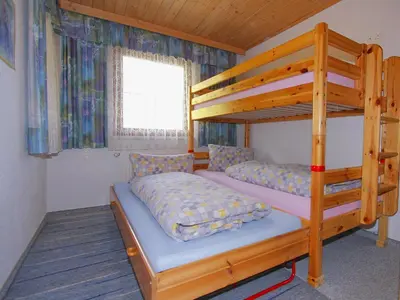 Ein Bett oder Betten in einem Zimmer der Unterkunft Apartment Untererhof-1 by Interhome