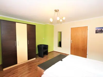 Ein Bett oder Betten in einem Zimmer der Unterkunft Apartment Heidi-2 by Interhome