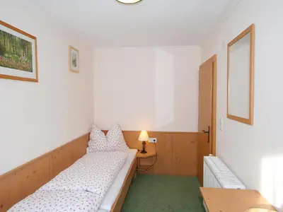 Ein Bett oder Betten in einem Zimmer der Unterkunft Apartment Fabian by Interhome