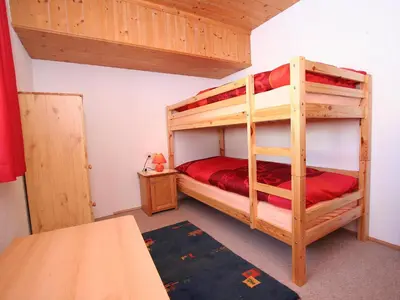 Ein Bett oder Betten in einem Zimmer der Unterkunft Apartment Annelies-3 by Interhome