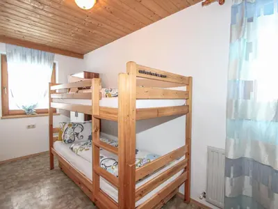 Ein Bett oder Betten in einem Zimmer der Unterkunft Chalet Katharina by Interhome