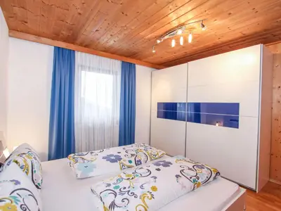 Ein Bett oder Betten in einem Zimmer der Unterkunft Chalet Katharina by Interhome