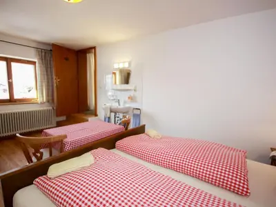Ein Bett oder Betten in einem Zimmer der Unterkunft Holiday Home Fliegerklause by Interhome