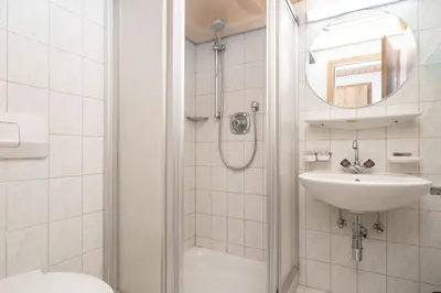 Ein Badezimmer in der Unterkunft Hofers Herzstück
