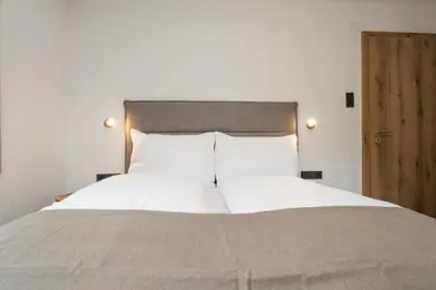 Ein Bett oder Betten in einem Zimmer der Unterkunft Hofers Herzstück