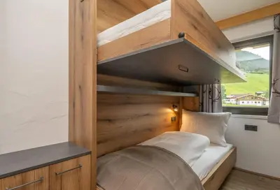 Ein Bett oder Betten in einem Zimmer der Unterkunft Hofers Herzstück