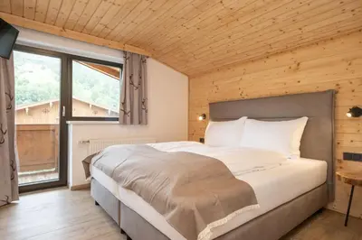 Ein Bett oder Betten in einem Zimmer der Unterkunft Hofers Herzstück