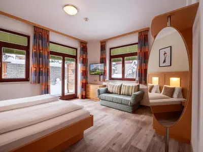 Ein Bett oder Betten in einem Zimmer der Unterkunft Appartements Holiday