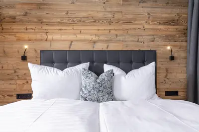 Ein Bett oder Betten in einem Zimmer der Unterkunft Bichlhof Going