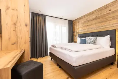 Ein Bett oder Betten in einem Zimmer der Unterkunft Bichlhof Going
