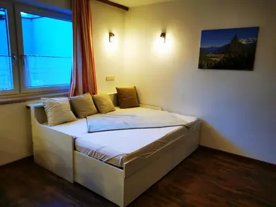 Ein Bett oder Betten in einem Zimmer der Unterkunft Ferienwohnung Obermoser
