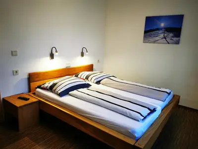 Ein Bett oder Betten in einem Zimmer der Unterkunft Ferienwohnung Obermoser