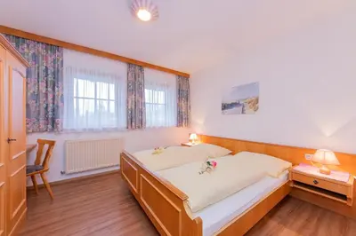 Ein Bett oder Betten in einem Zimmer der Unterkunft Ferienwohnungen Christine
