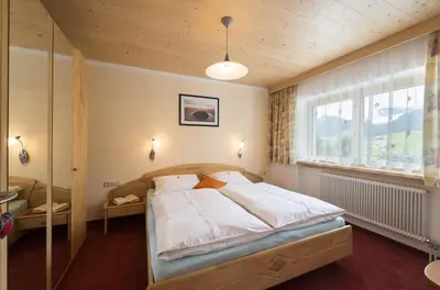 Ein Bett oder Betten in einem Zimmer der Unterkunft Ferienhof Auerhof