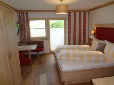 Ein Bett oder Betten in einem Zimmer der Unterkunft Ferienhof Auerhof