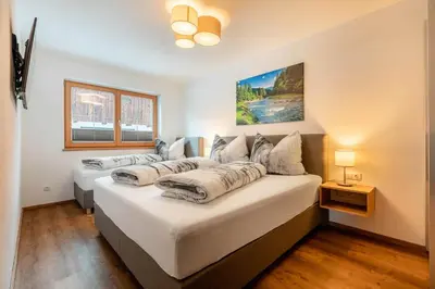 Ein Bett oder Betten in einem Zimmer der Unterkunft Ferienwohnungen Lehenhof