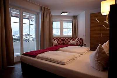 Ein Bett oder Betten in einem Zimmer der Unterkunft Villa Sepp