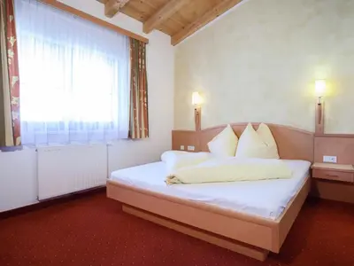 Ein Bett oder Betten in einem Zimmer der Unterkunft Apartment in Kaltenbach near Ski Lift