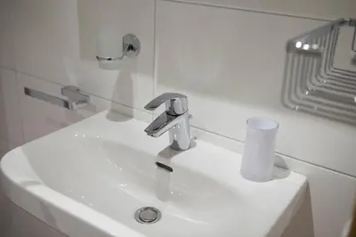 Ein Badezimmer in der Unterkunft Appartement zum Turm Top 4