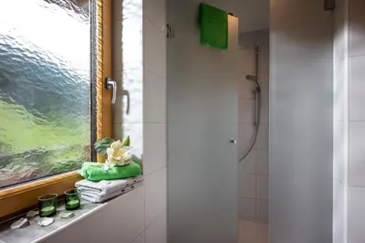 Ein Badezimmer in der Unterkunft Saibatenhof
