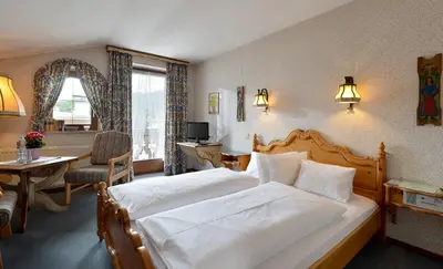 Ein Bett oder Betten in einem Zimmer der Unterkunft Alpenappartement Europa