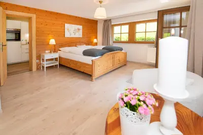 Ein Bett oder Betten in einem Zimmer der Unterkunft Fürstenhäusl Alpbach - GREEN Apartments & Studio