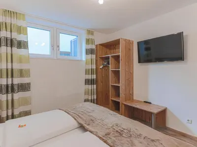 Ein Bett oder Betten in einem Zimmer der Unterkunft Apartment in Brixen near Ski Welt