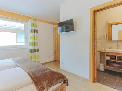 Ein Bett oder Betten in einem Zimmer der Unterkunft Apartment Brixen near Ski Lift