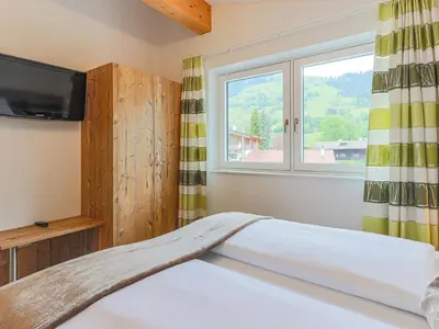 Ein Bett oder Betten in einem Zimmer der Unterkunft Apartment Brixen near Ski Lift