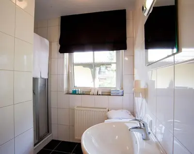 Ein Badezimmer in der Unterkunft Chalet Alpinresort
