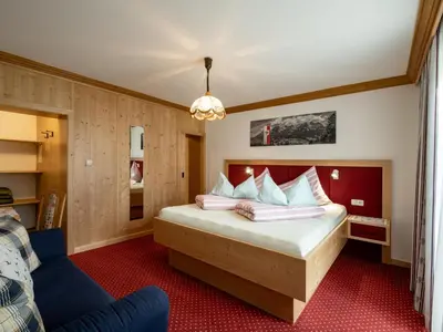 Ein Bett oder Betten in einem Zimmer der Unterkunft Schnapperhof