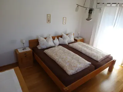 Ein Bett oder Betten in einem Zimmer der Unterkunft Landhaus Sommerau
