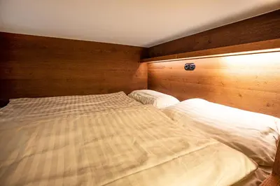 Ein Bett oder Betten in einem Zimmer der Unterkunft Haus Wiesberger Apartment TOP25 Südseite
