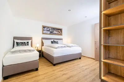 Ein Bett oder Betten in einem Zimmer der Unterkunft Apartment Rainer - mittendrin